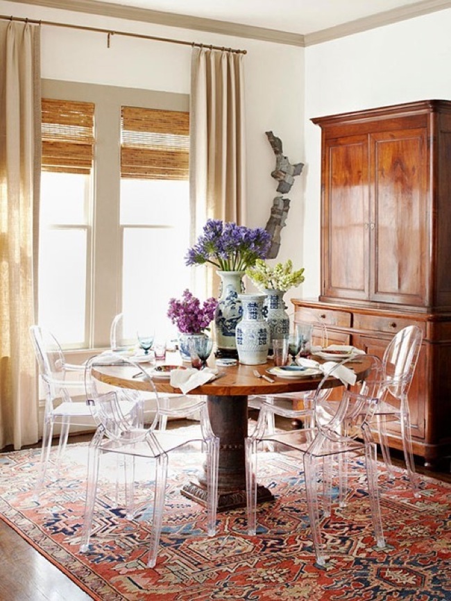 lucite chairs in traditional dining room