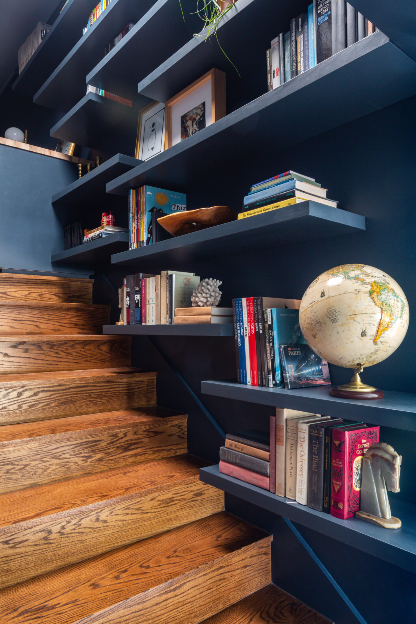 floating shelves above stairs