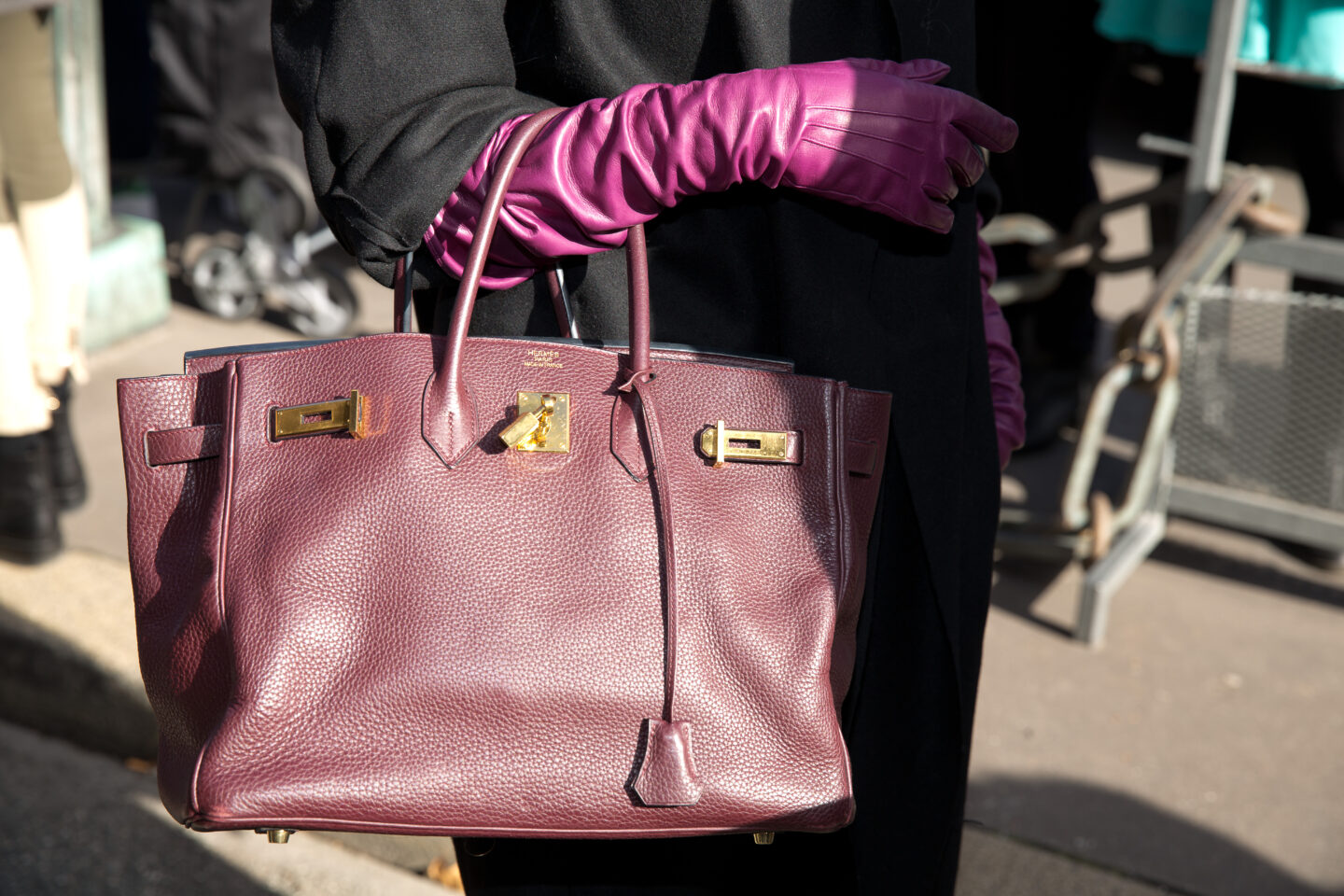 how to buy a designer bag for less